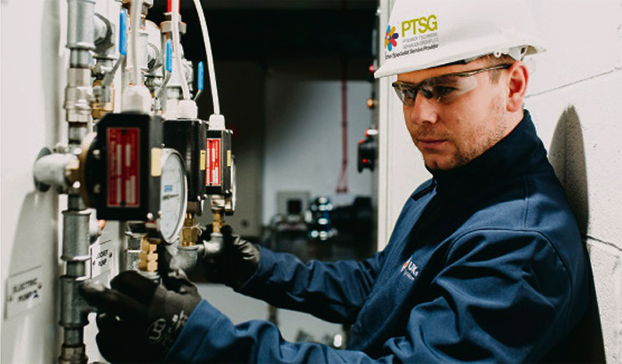PTSG Technician working on pressure system